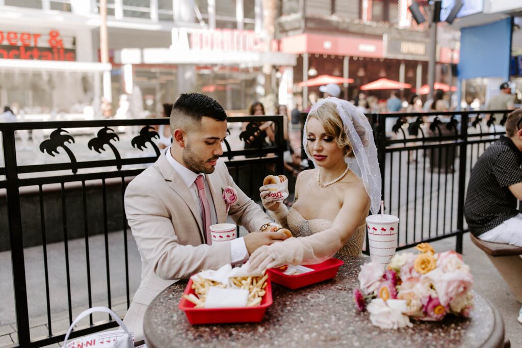 Couple eating In-N-Out during elopement in Las Vegas