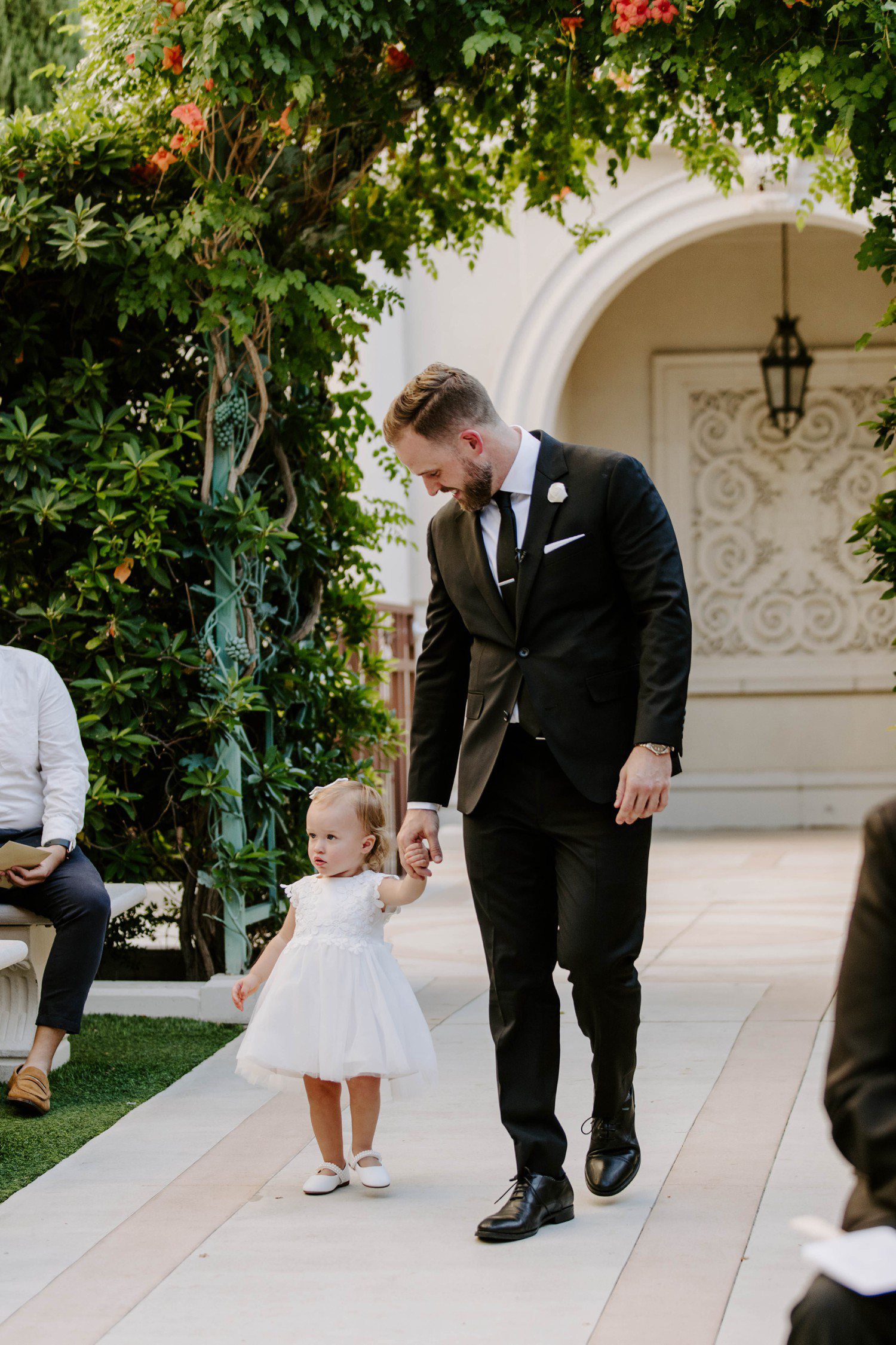 Groom and Daughter walk down aisle