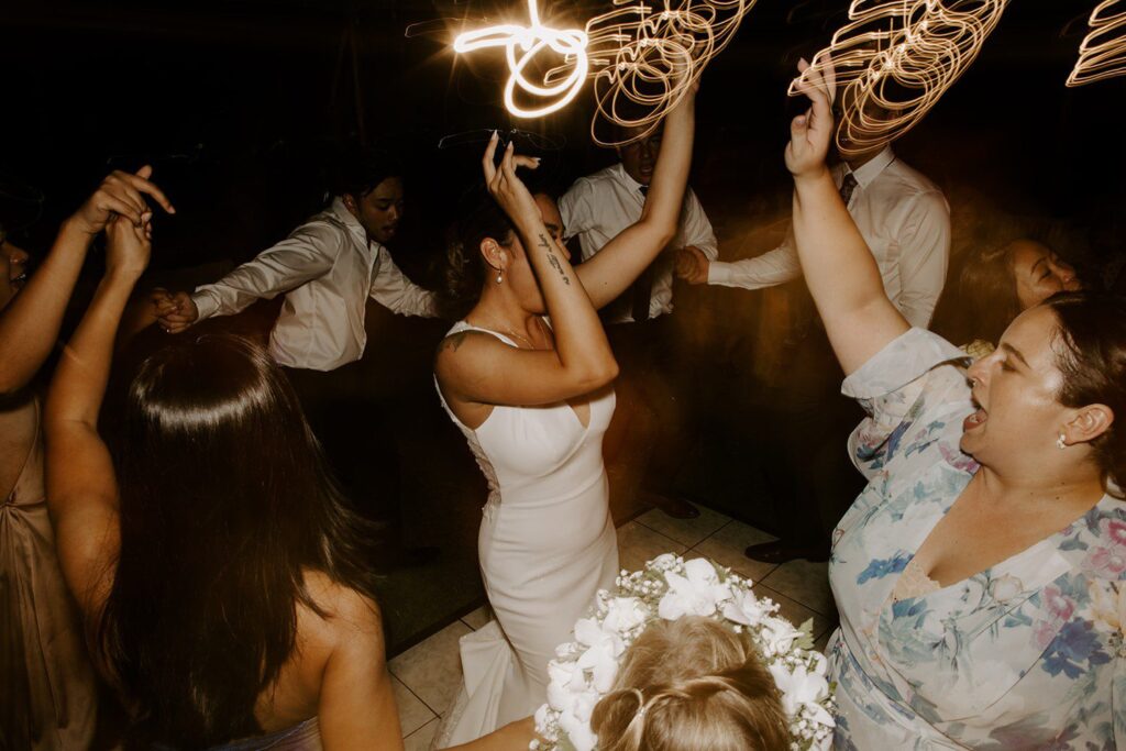 Bride dancing at wedding reception at LouLu Palm
