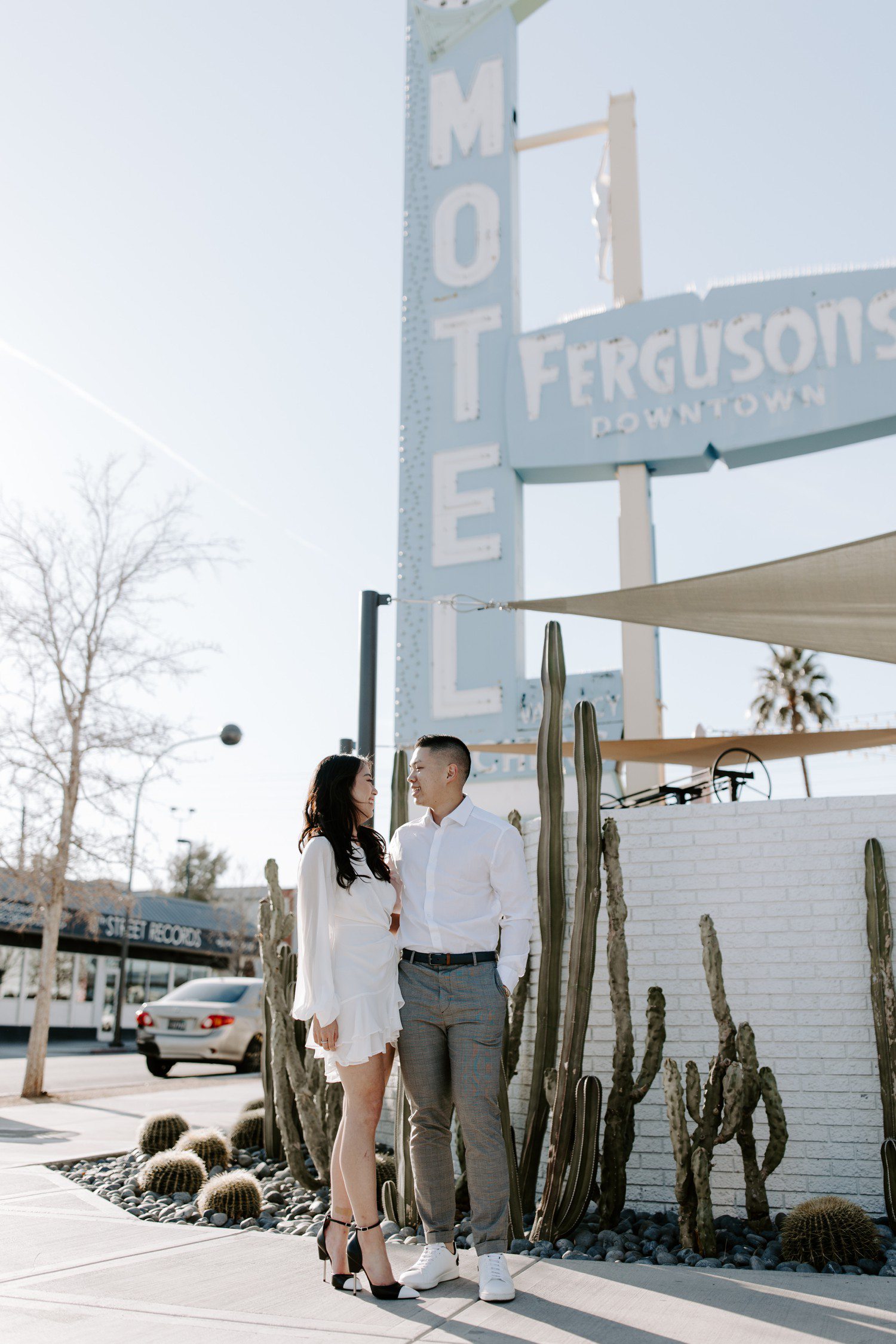 Fremont Street Engagement Photos in Las Vegas with neon sign. 