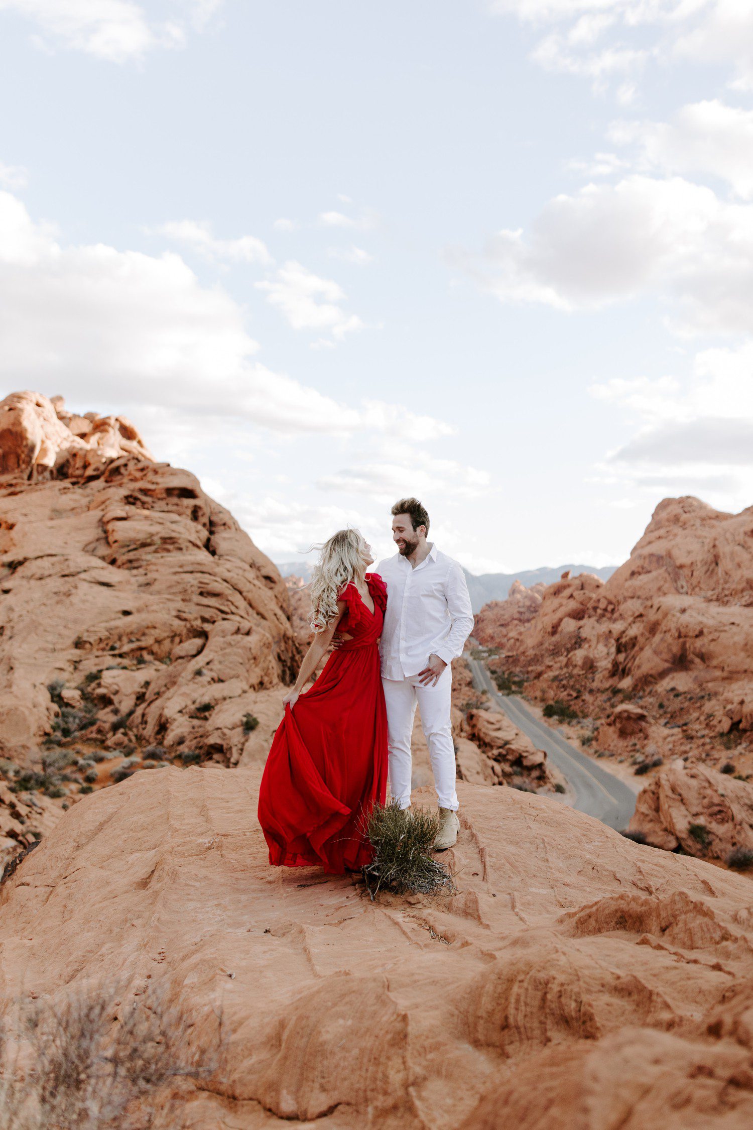 Las Vegas engagement session at Valley of Fire with view of road. 