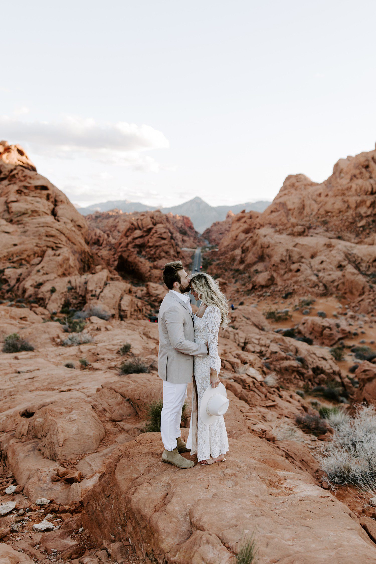 Valley of Fire Engagement Photos with guy kissing forehead. 