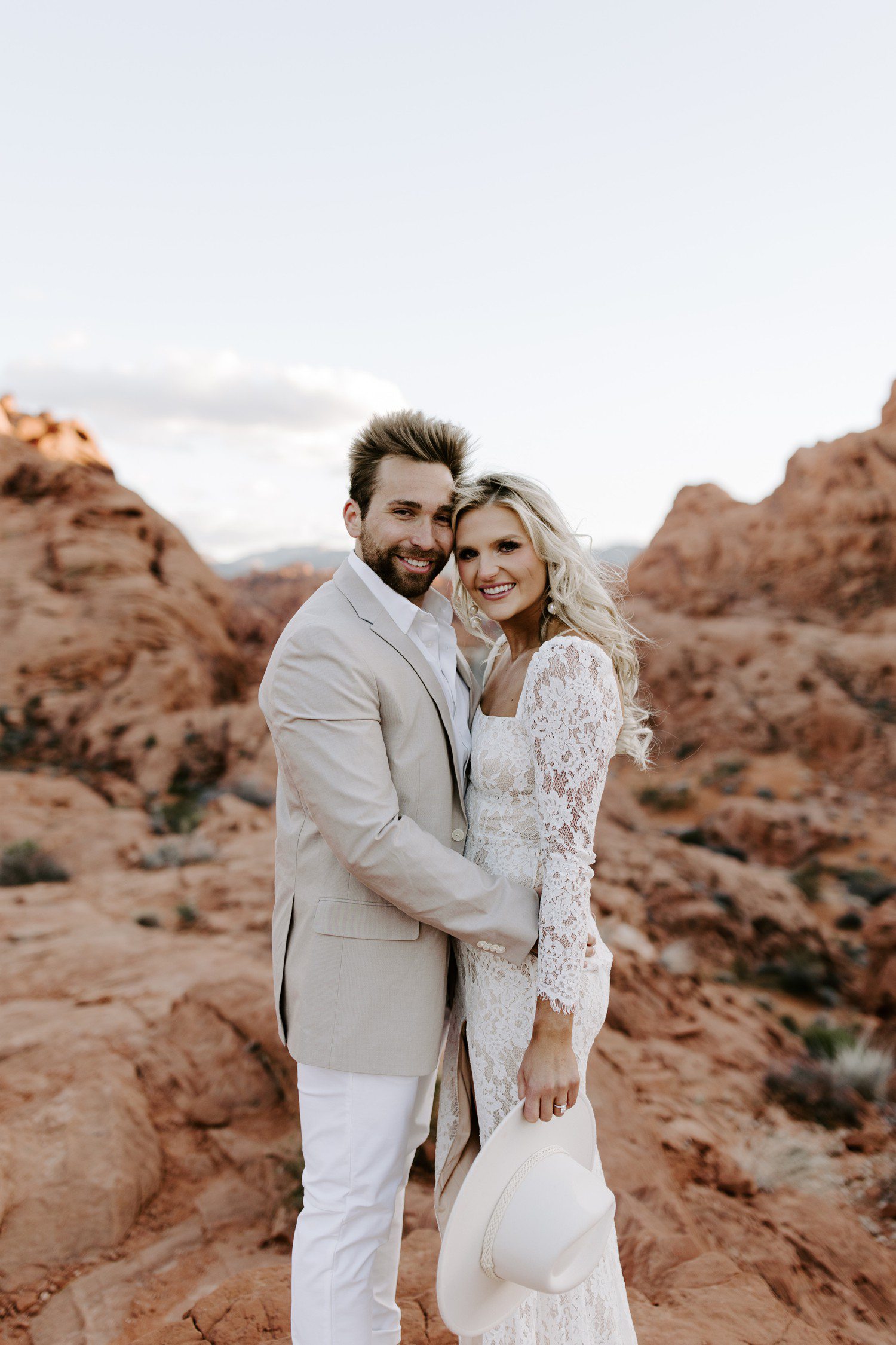 Couple smiling for Las Vegas engagement session at Valley of Fire. 