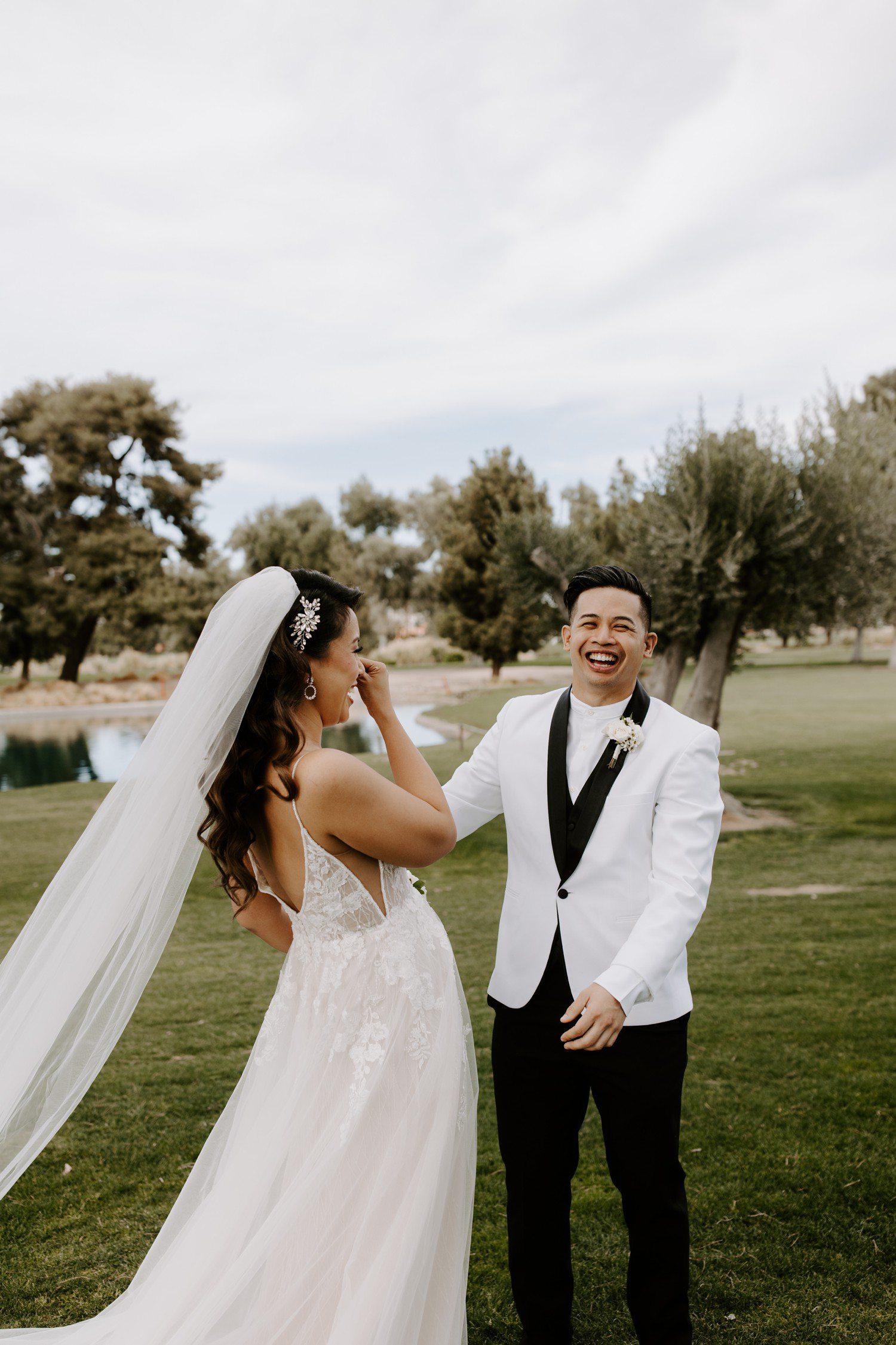 Bride and groom first look reactions at Las Vegas Country Club. 