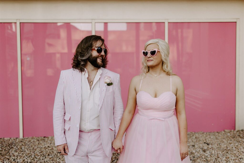 60's inspired Las Vegas Wedding with couple wearing pink.