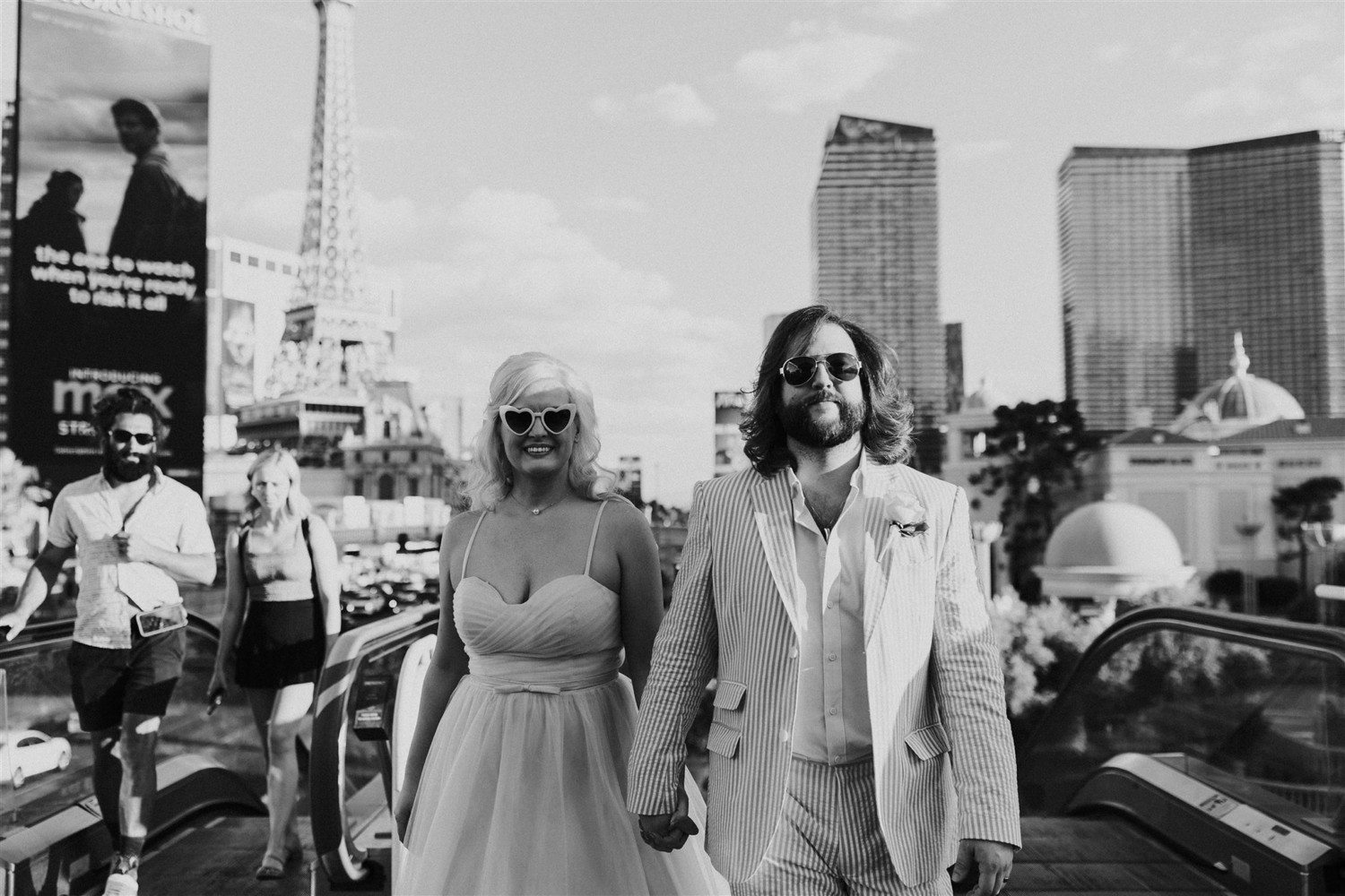 Couple walking down the strip in Las Vegas.