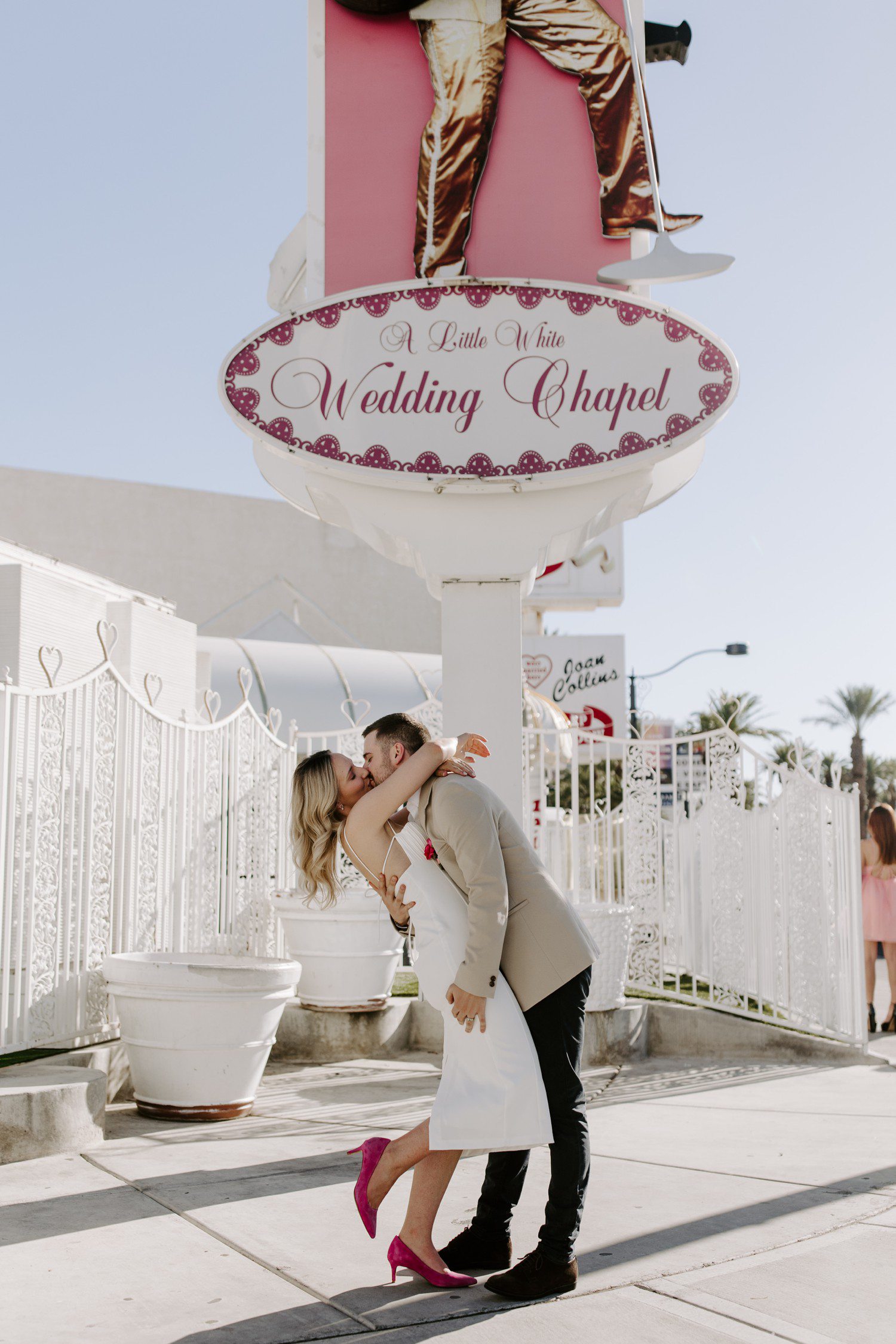 Couple kissing during elopement photos at A Little White Chapel.