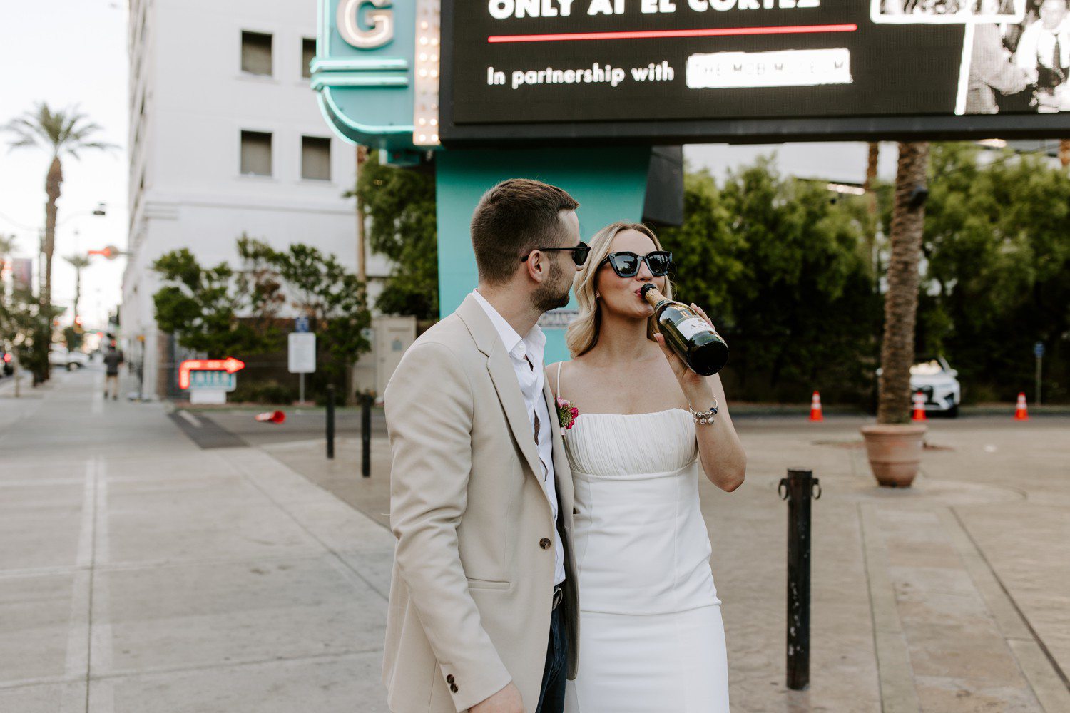 Couple drinking champagne to celebrate Las Vegas elopement.