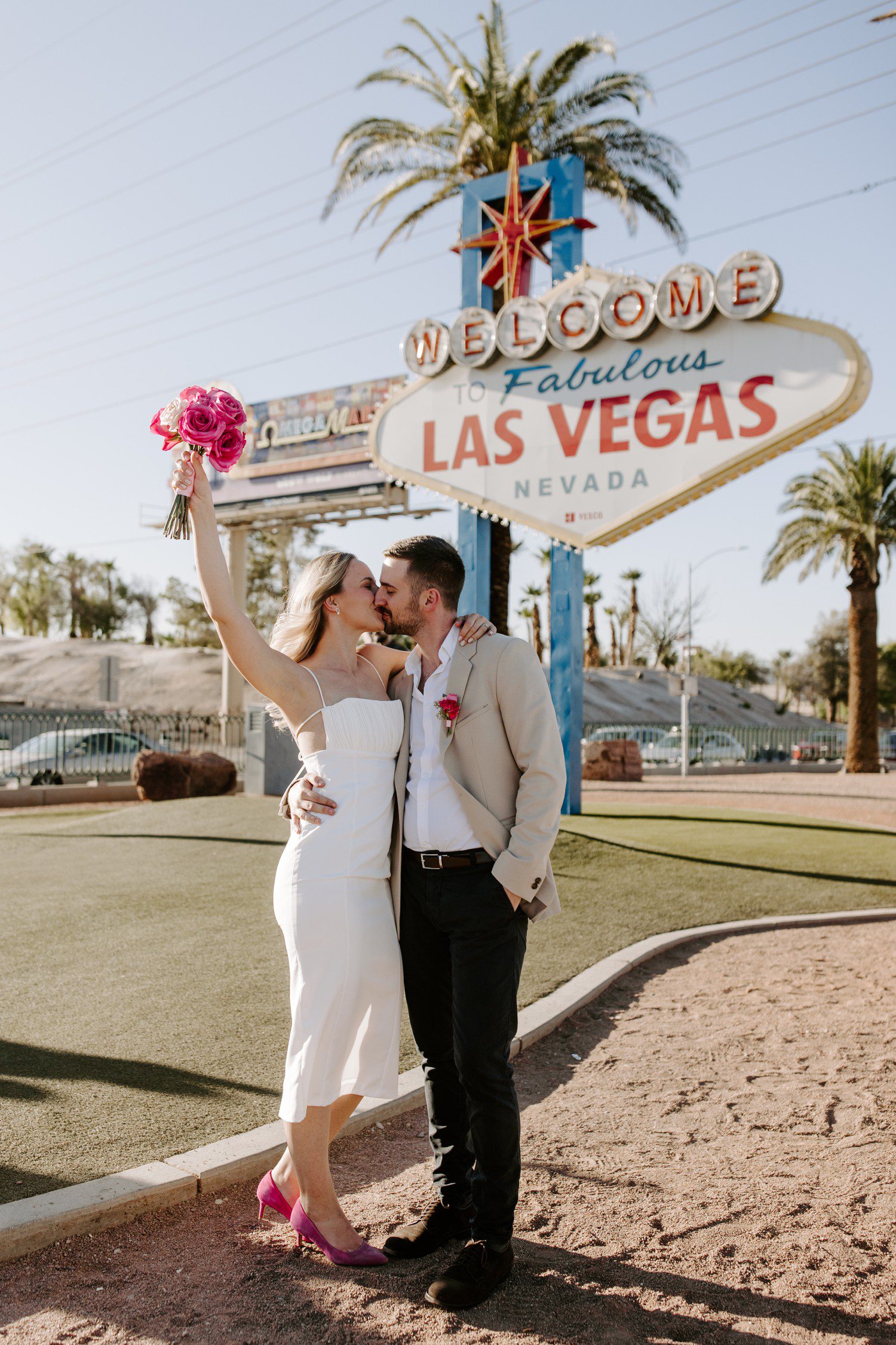 Wedding photos at the Las Vegas sign.