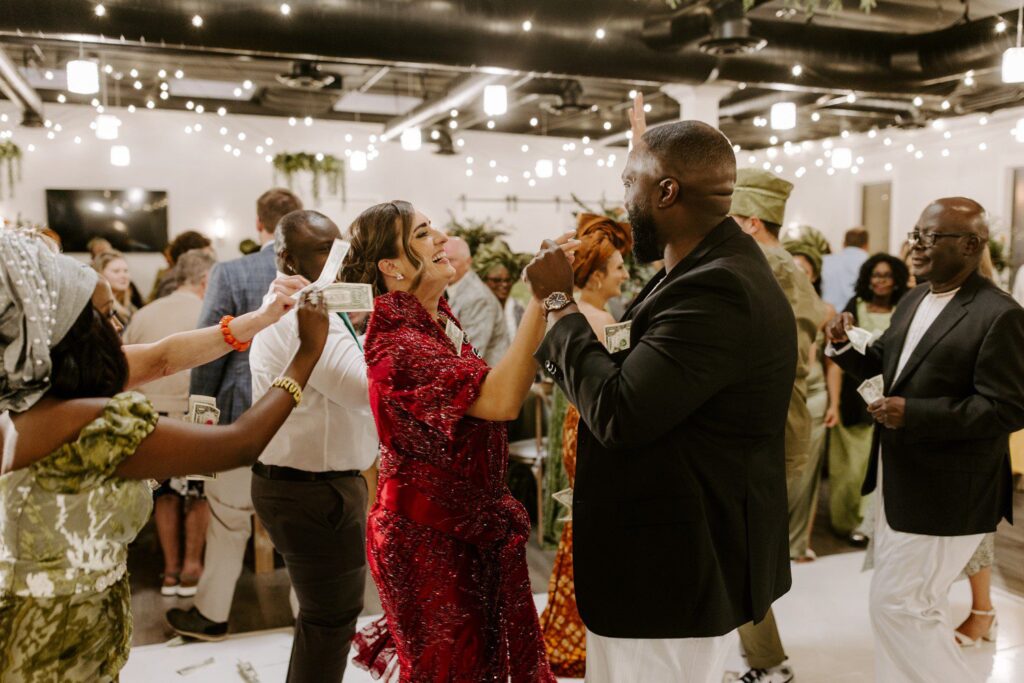 Bride and groom dancing during Nigerian wedding reception in Las Vegas. 