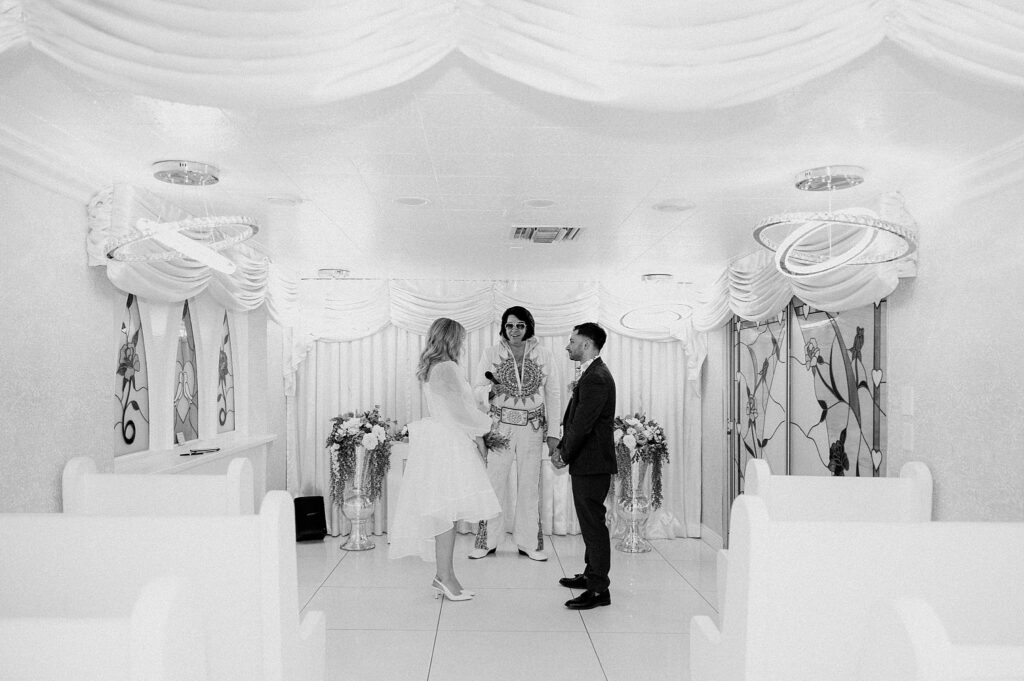 couple stands at altar during Elvis ceremony