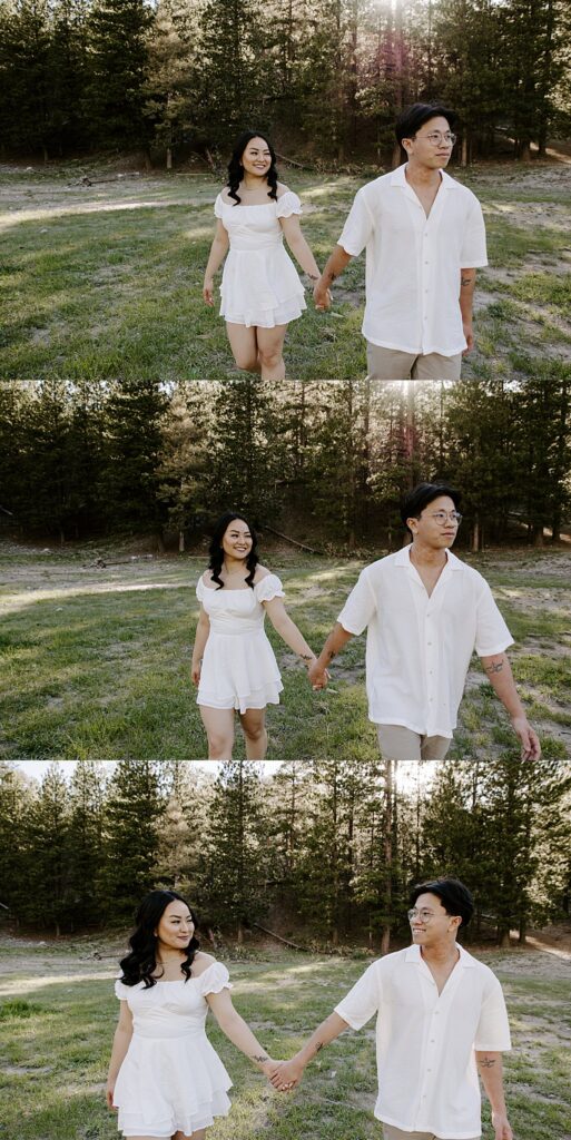 man leads woman as they walk in park by Katelyn Faye Photography