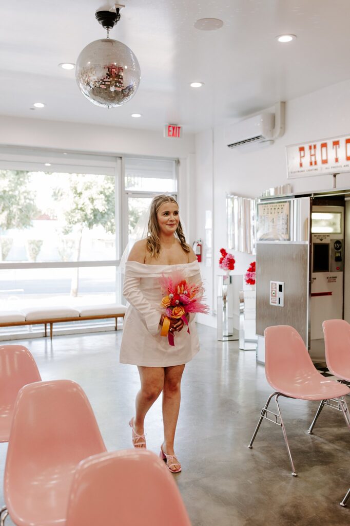 bride walks down aisle by Las Vegas elopement photographer