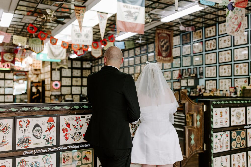 newlyweds wait to get tattoos together by Katelyn Faye Photography