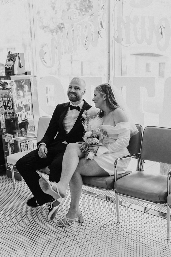 couple waits to get tattoos by Las Vegas elopement photographer