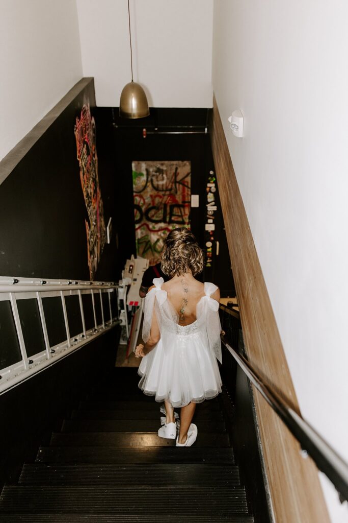 bride walks down stairs by Las Vegas Wedding photographer