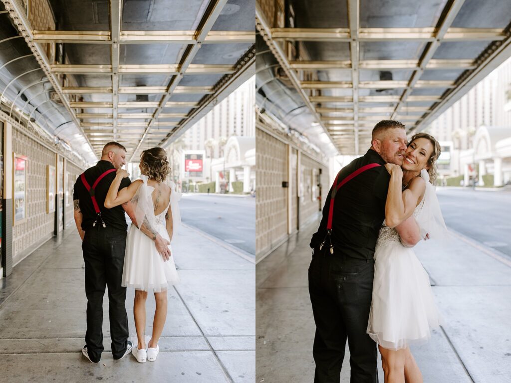 couple hugs along street by Las Vegas Wedding photographer