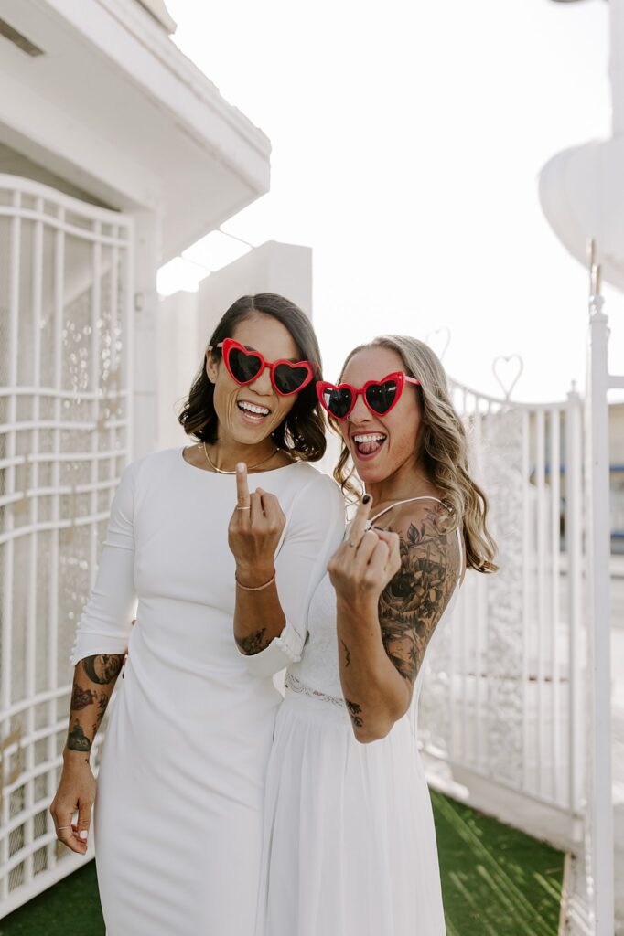 new wives show off rings by Las Vegas elopement photographer