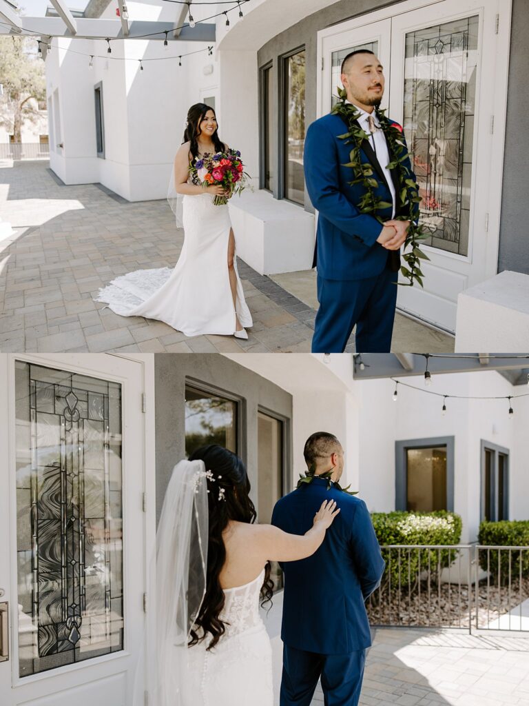 woman walks up behind man for first look by Las Vegas wedding photographer