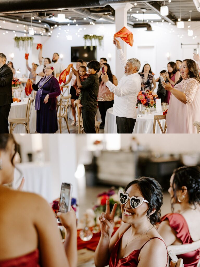 guests cheer and wave napkins during reception by Katelyn Faye Photography