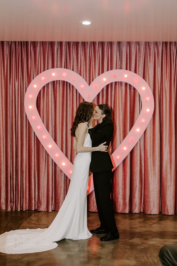 couple kisses after exchanging vows by Las Vegas elopement photographer