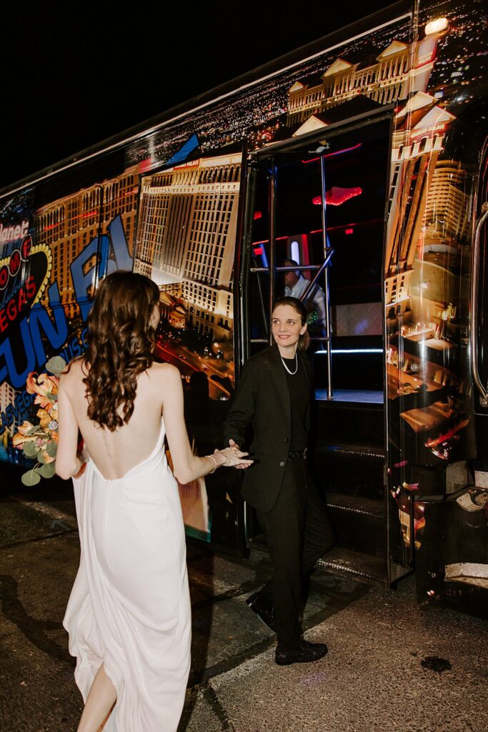 newlyweds get on party bus with guests after Sure Thing Chapel wedding