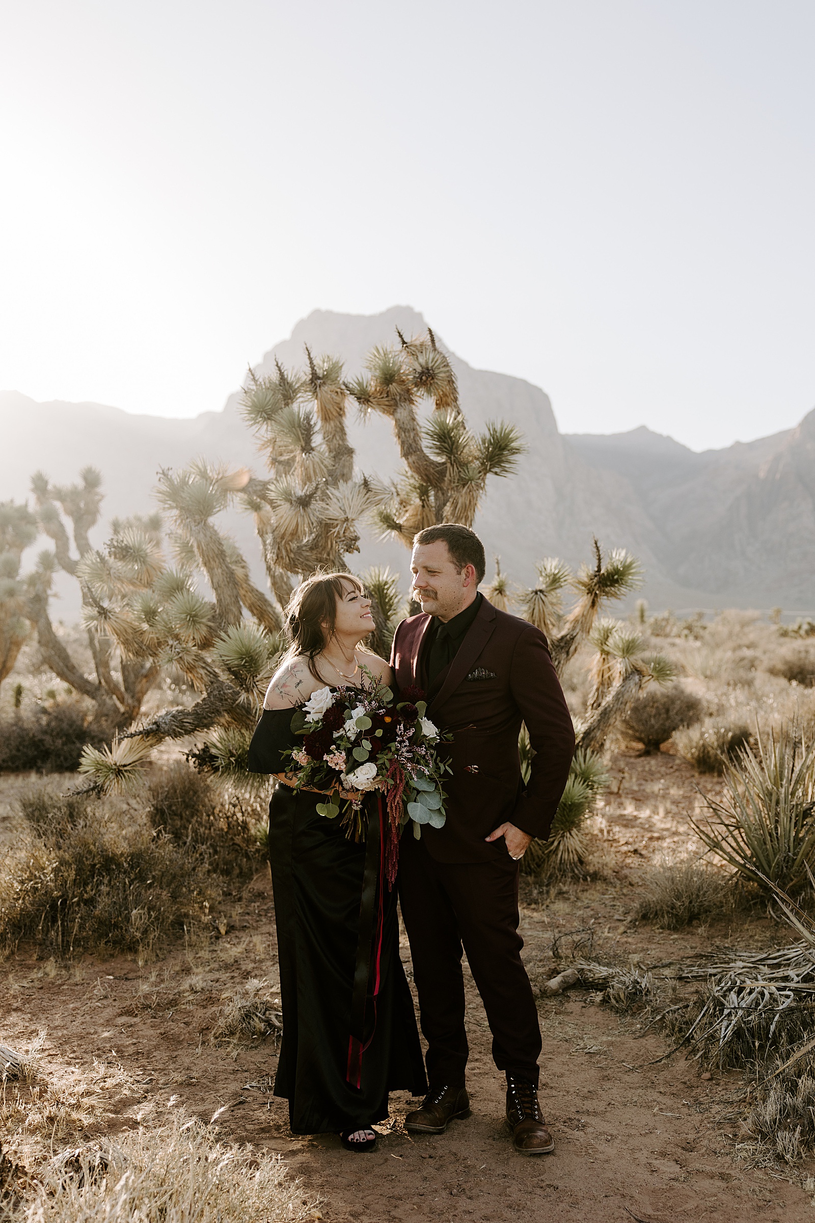 newlyweds hug at Spring Mountains  by Las Vegas Elopement Photographer