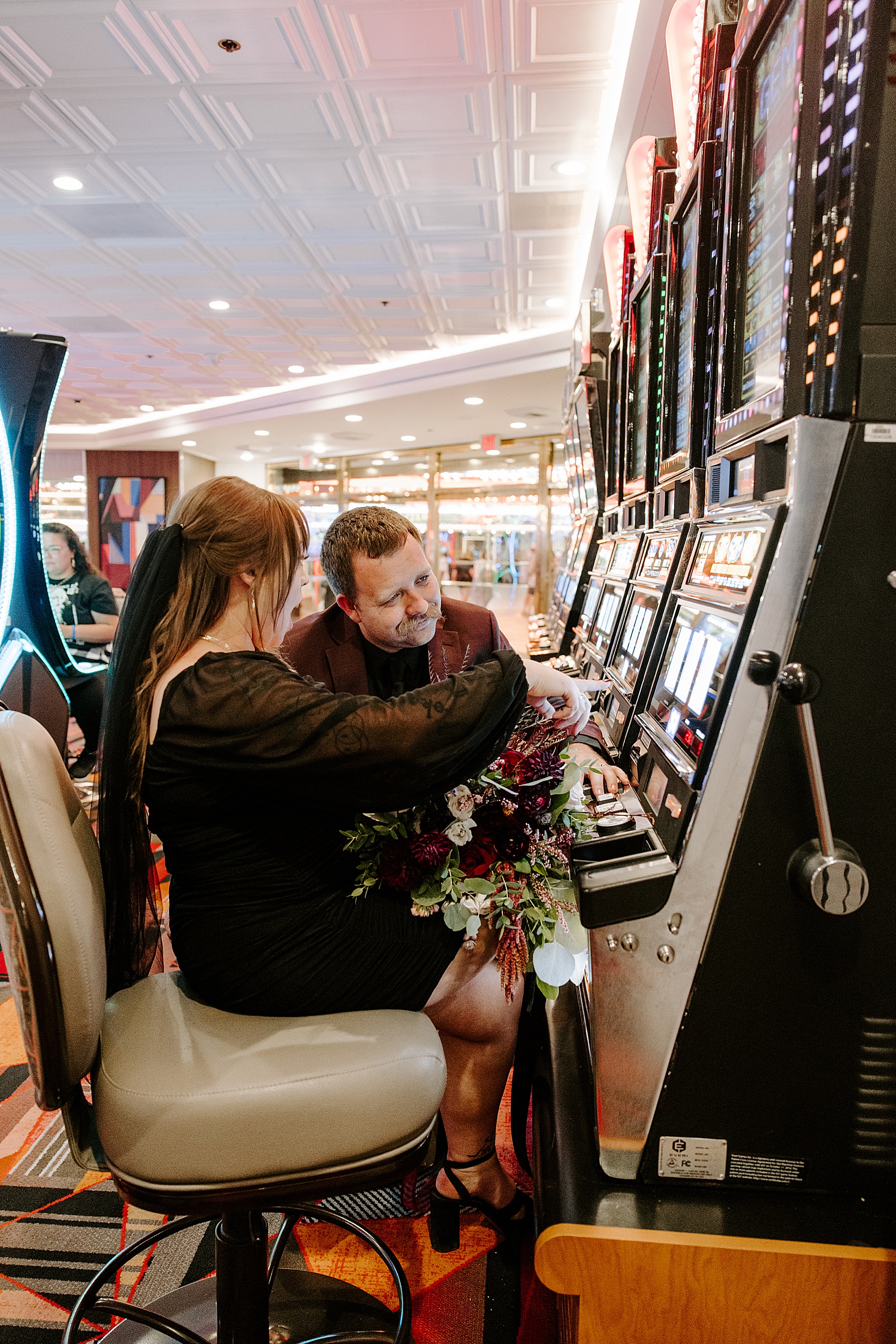 newlyweds play casino games after saying I Do by Katelyn Faye Photography 