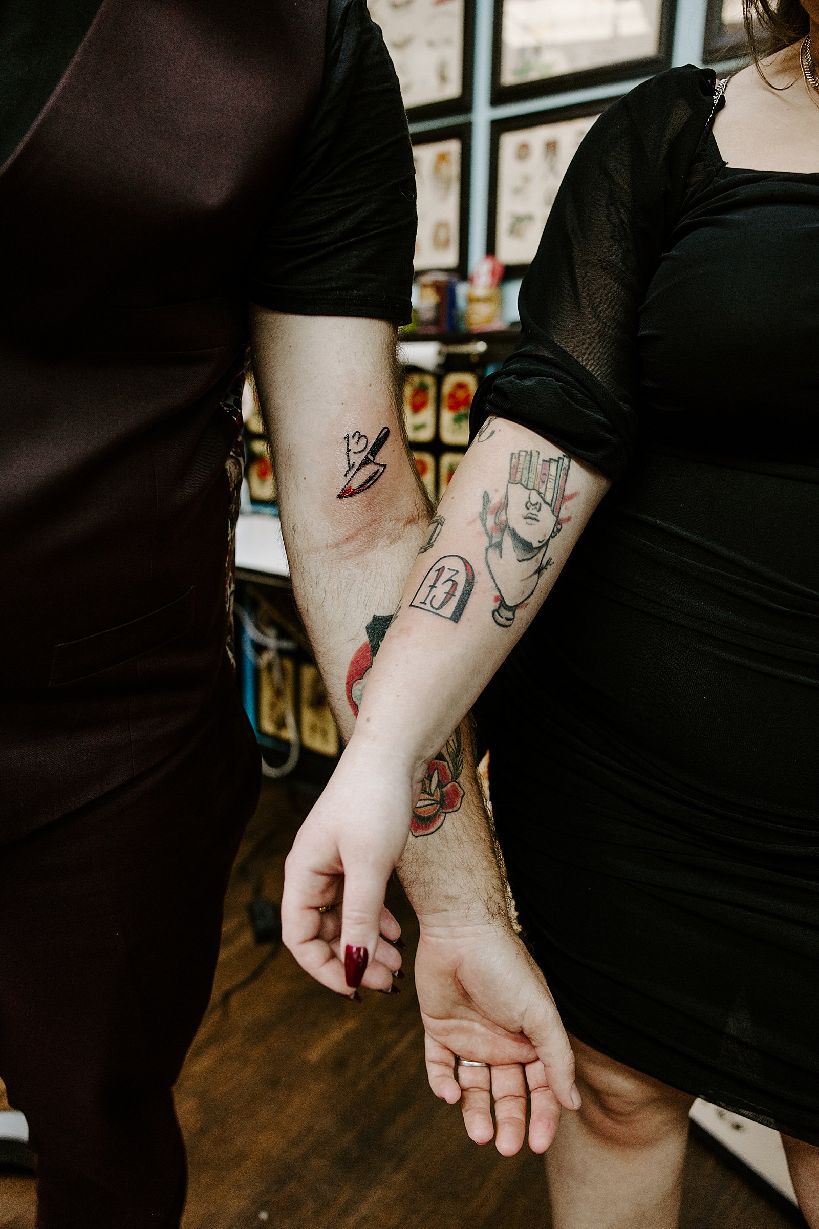 newlyweds show off Friday the 13th tattoos by Katelyn Faye Photography 