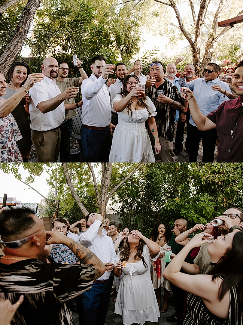 bride and groom share a shot with their friends by Katelyn Faye Photo