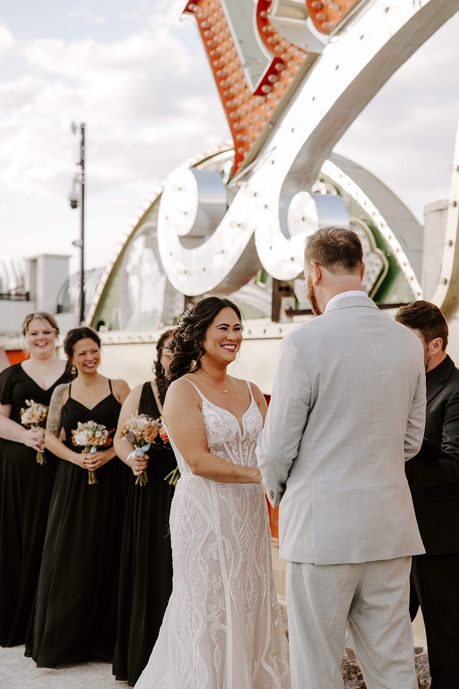 woman grins at her new husband by Katelyn Faye Photo