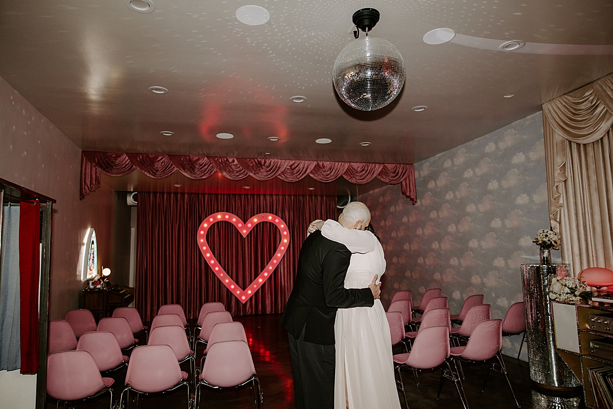 couple shares their first dance at intimate chapel elopement