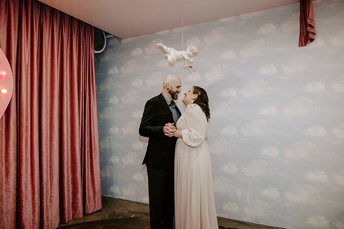 newly weds dance under cupid by katelyn faye photography