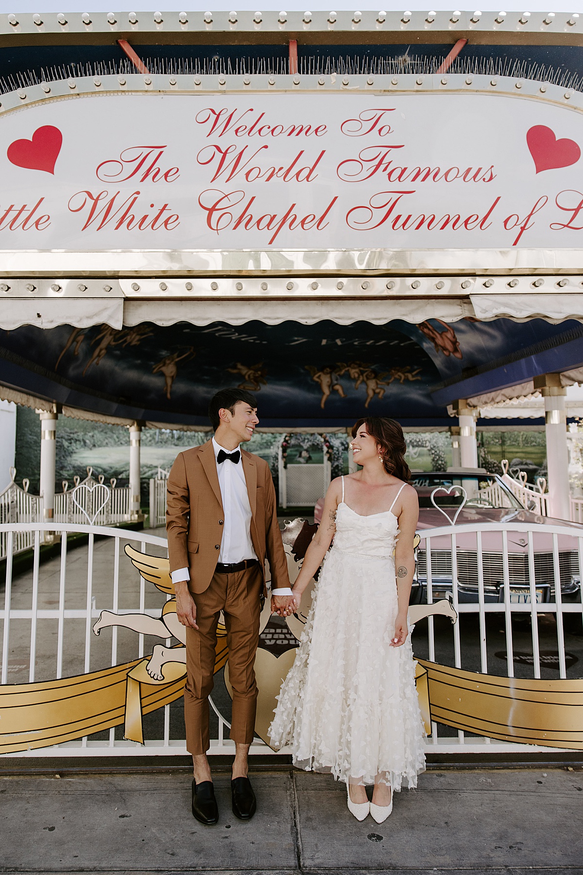 bride and groom smiling in wedding attire by katelyn faye photography