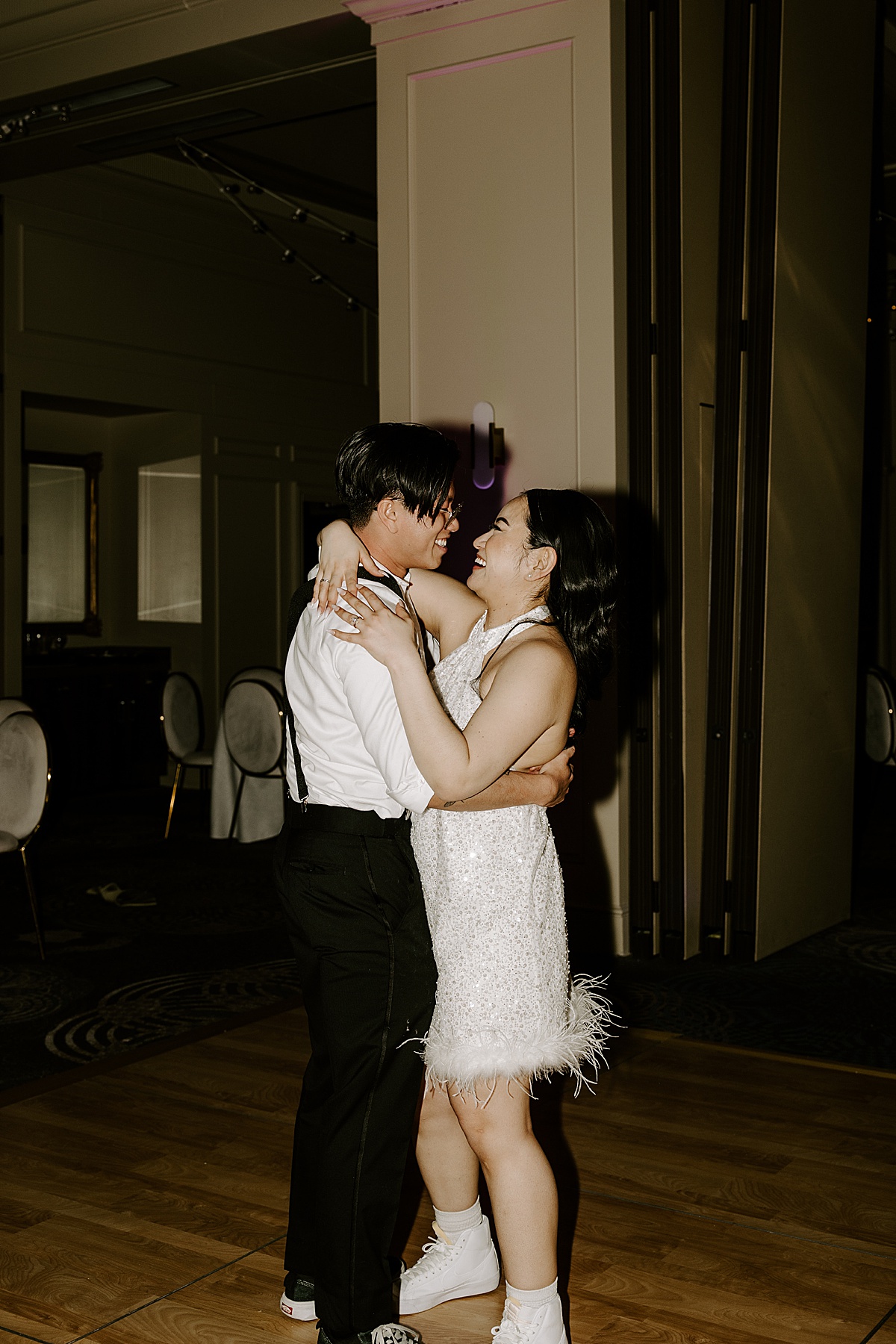 Couple enjoy private last dance with one another at the end of the night by Katelyn Faye Photo