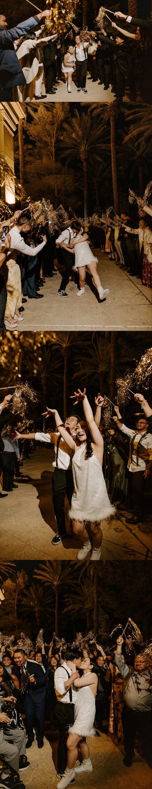 Couple exits their reception with guests waving gold streamers at the JW Marriott