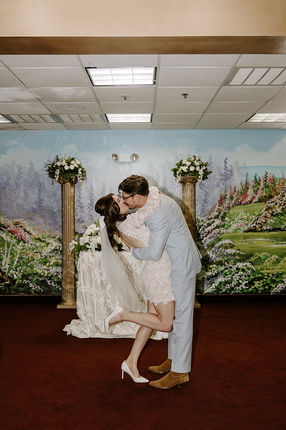 Couple share a first kiss after their ceremony by Katelyn Faye Photo