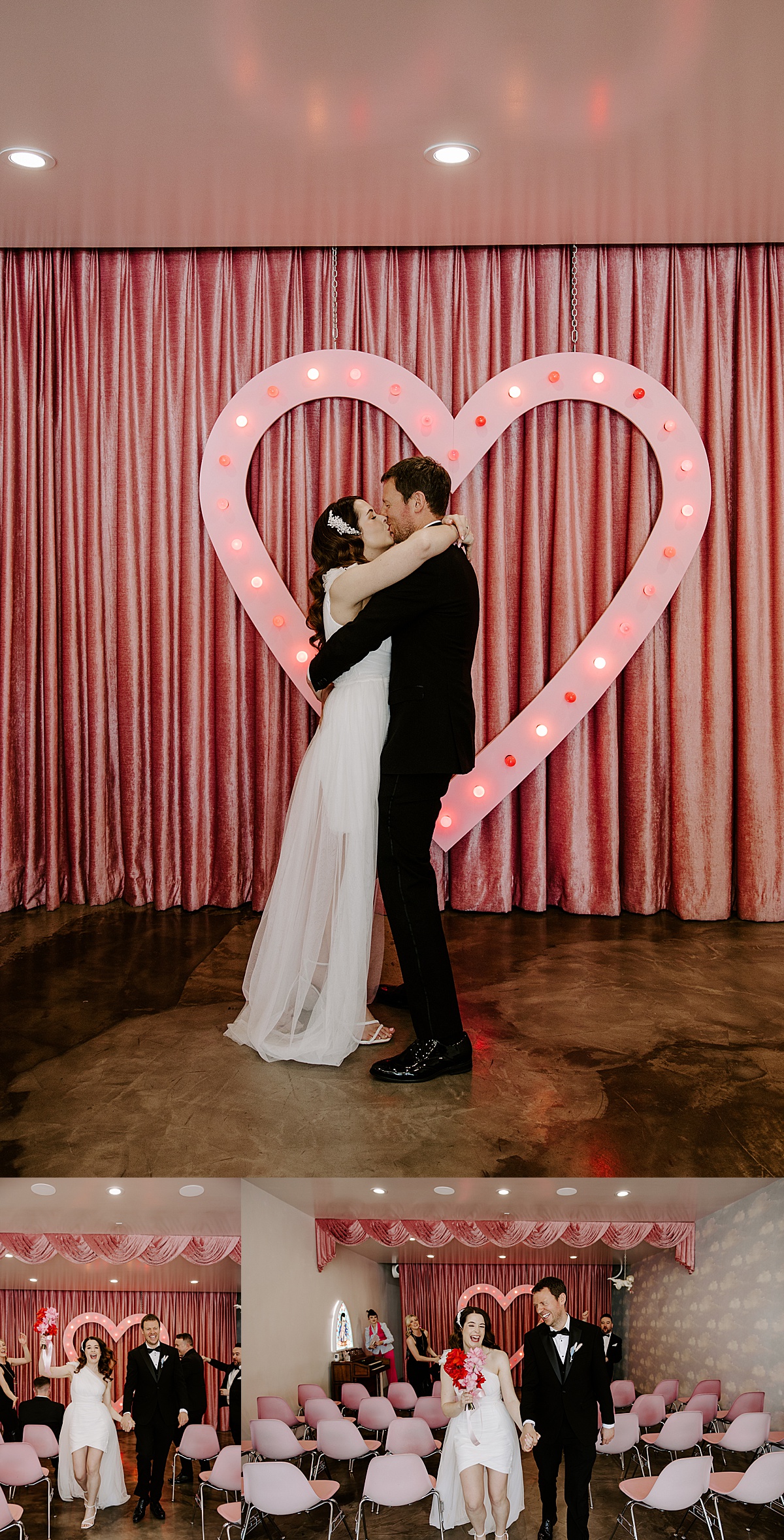 Couple shares first kiss at the end of their ceremony in front of giant pink heart by Katelyn Faye Photography