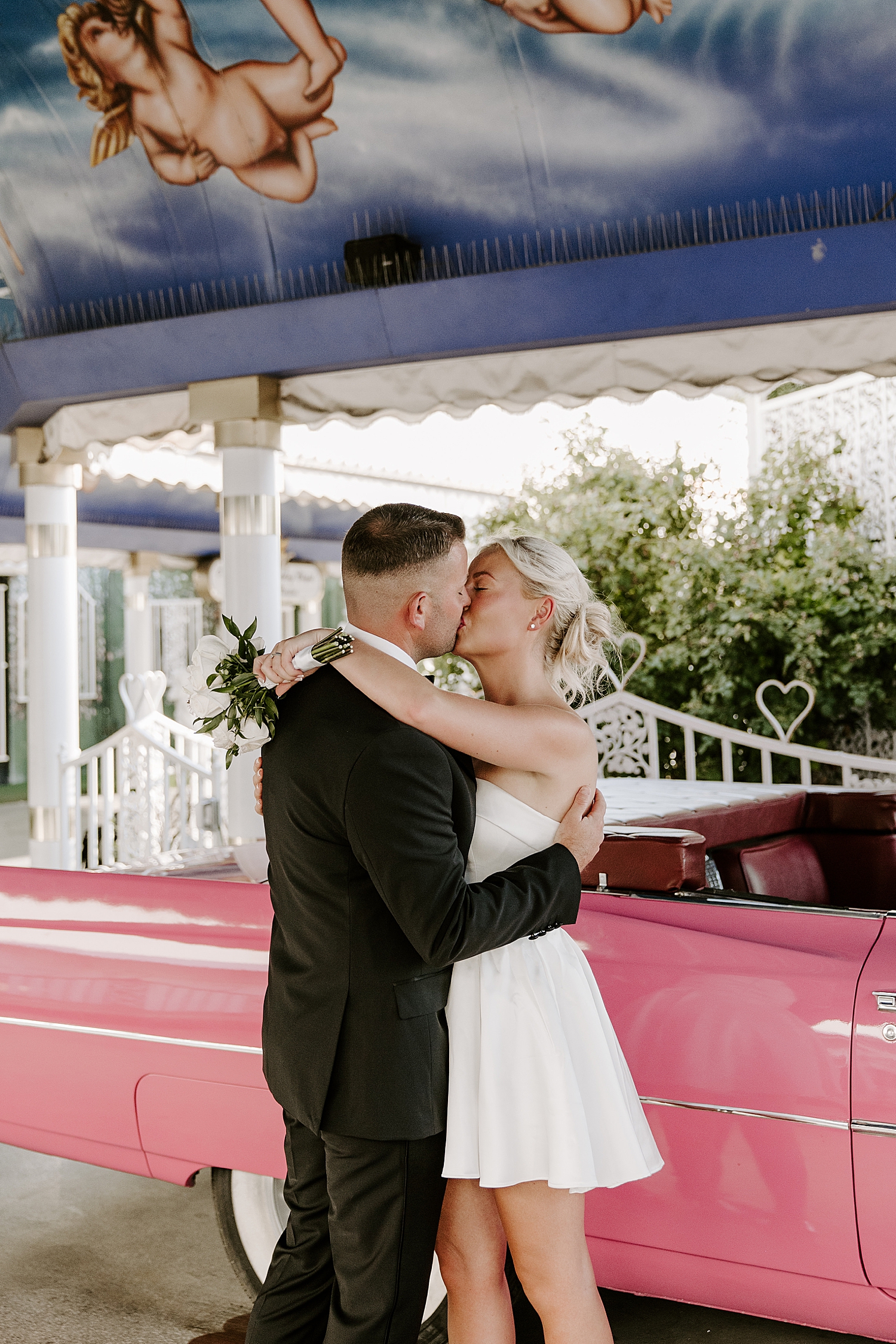 man and wife share a first kiss as married couple in the Tunnel of Love at the LWC