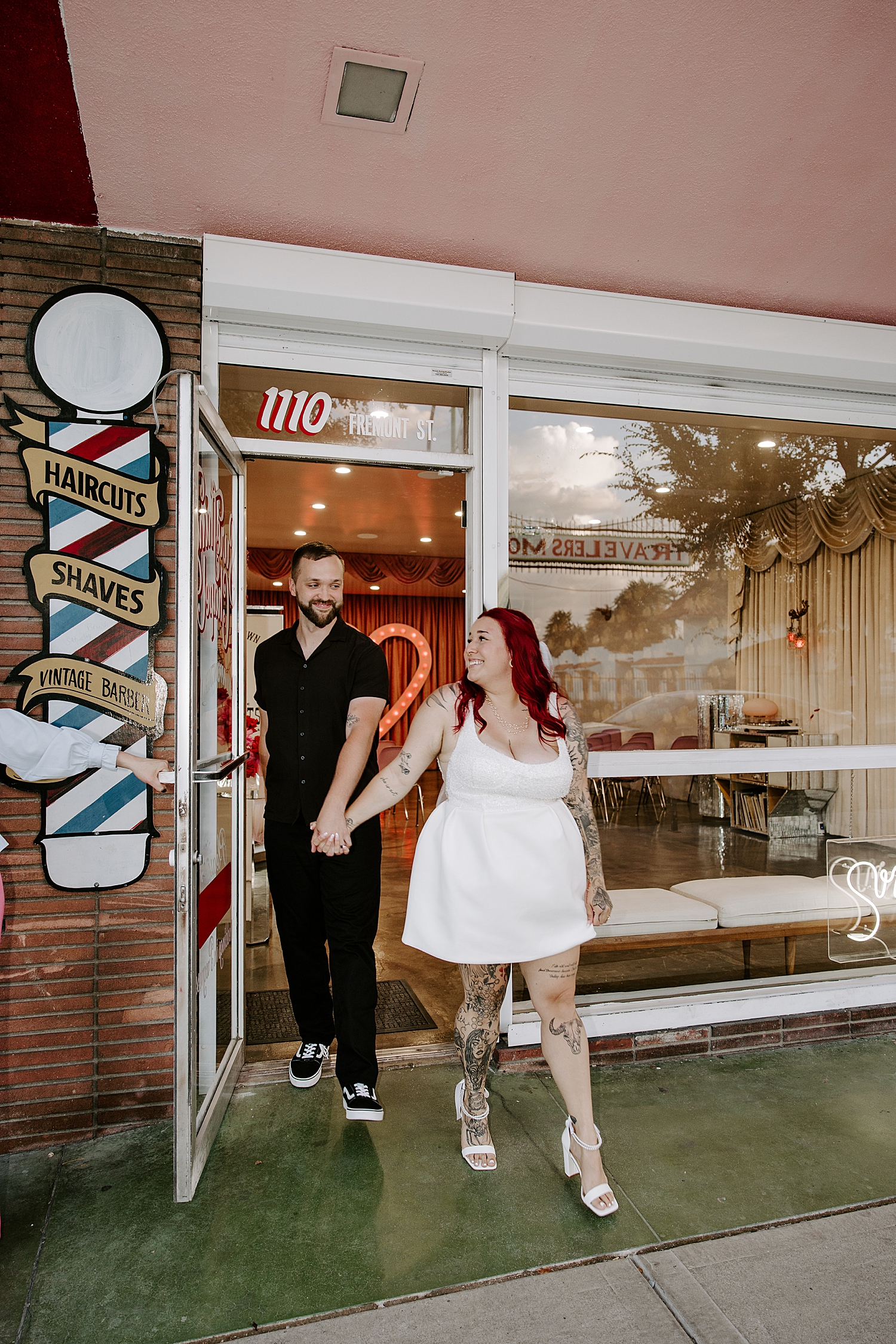 man and woman exit Sure Thing Chapel after their ceremony by Katelyn Faye Photography