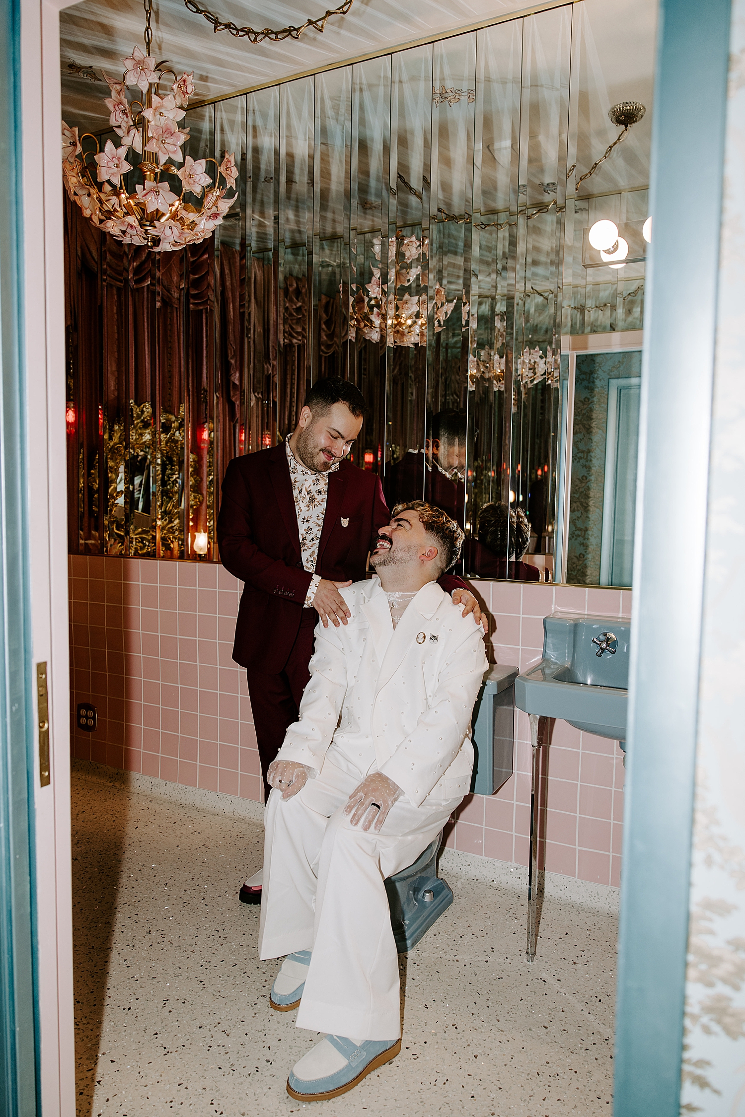 newlyweds sit together in the bathroom at Sure Thing Too