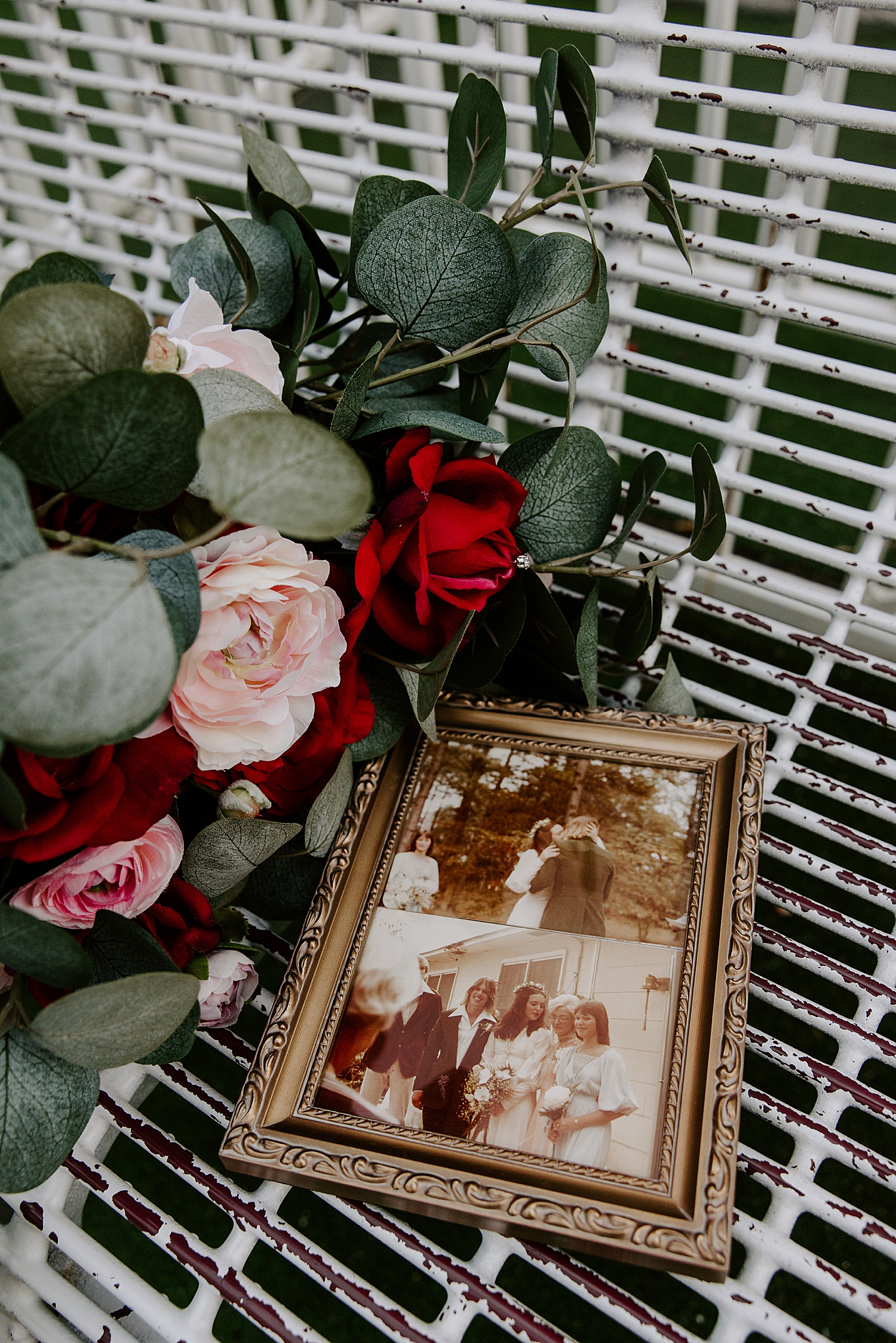 photo of bride's parents sits in chair next to flowers by Katelyn Faye Photography